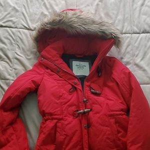 Red winter jacket with removable fur